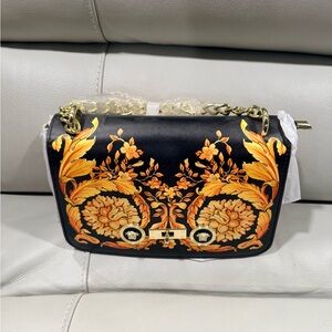Elegant Black and Gold Women's Bag
